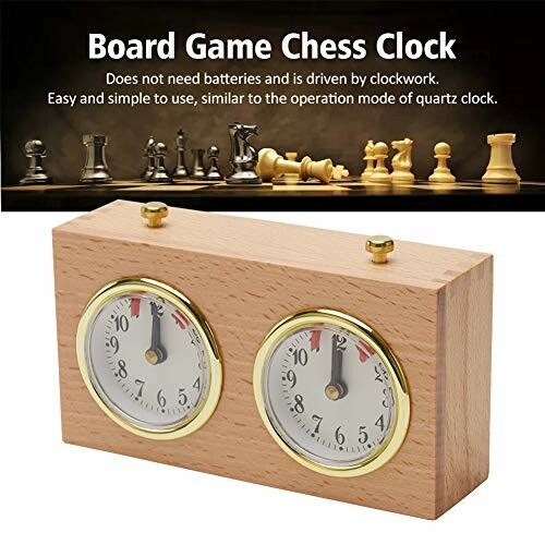 Wooden chess clock with dials, board game pieces in background.