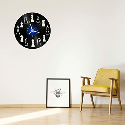 Chess-themed wall clock above a yellow chair and bee artwork.